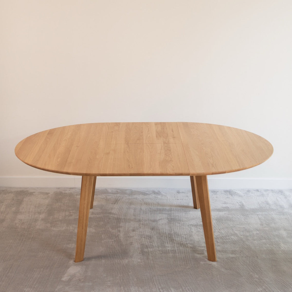 Mesa de comedor de madera maciza de Roble redonda extensible Saga | VESKOR