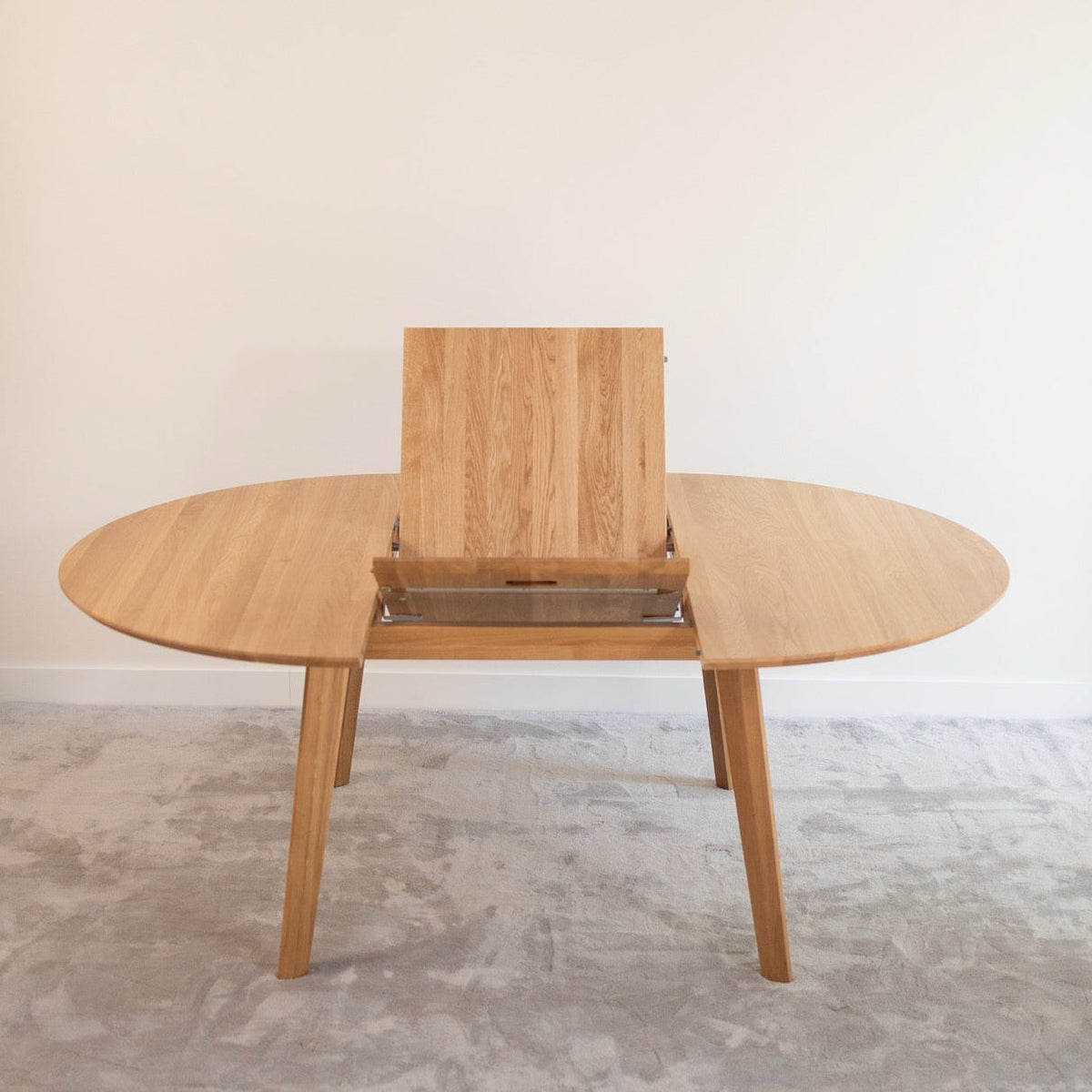 Mesa de comedor de madera maciza de Roble redonda extensible Saga | VESKOR